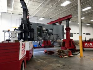 Installation process of a 100,000 lb. press brake with use of a gantry system.